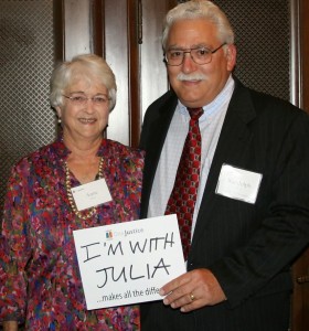 Anne & Randy Silver at the 2014 event holding a sign that says "I'm with Julia"